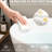 59" Freestanding Solid Surface Soaking Bathtub In Glossy White, Wide Sitting Area For Relaxation, Copper Drain System, Good Thermal Insulating Property White Made From Surface, Spa - Like Bathing