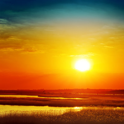 Sunset Over River - Wrapped Canvas Print