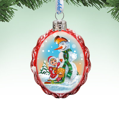 Ornement de verre bonhomme de neige playing