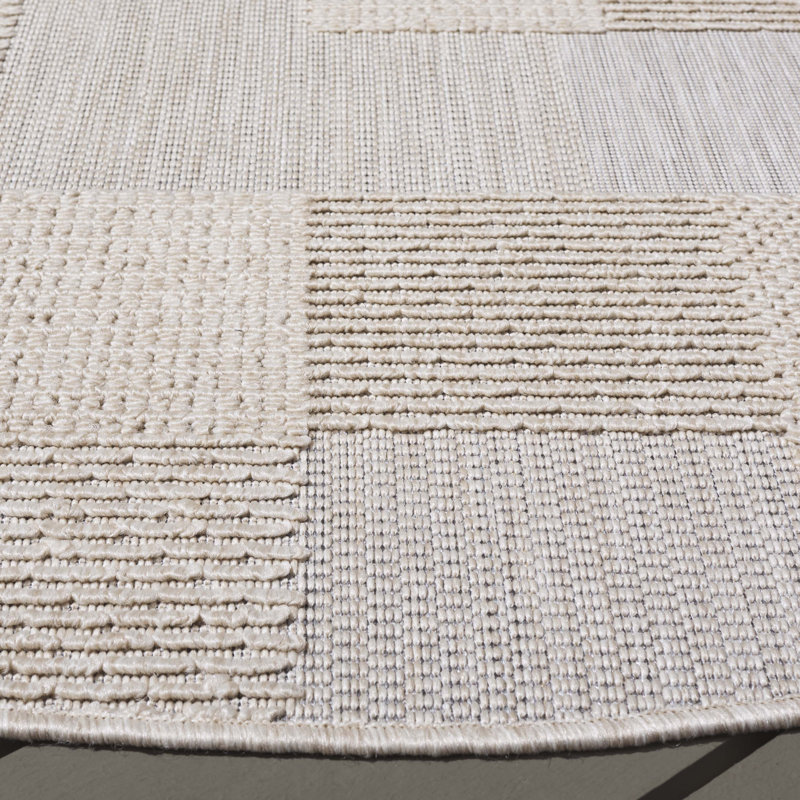 Tapis d'intérieur / extérieur à motif géométrique Sanchia Performance, Rond 6 pi 7 po