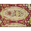 Remarquable couleur de fond rouge-rubis avec bordure noire et motif médaillon / écusson antique de style Karabagh rond 9 pi 3 po