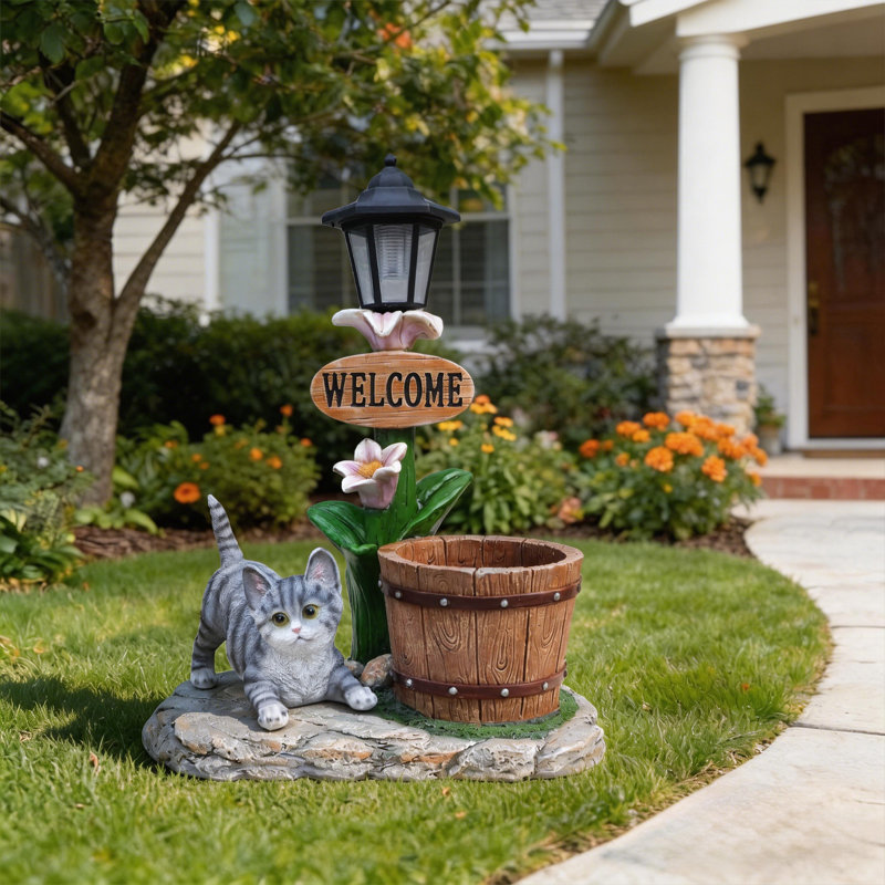 Décoration de jardin jardinière chat allongé