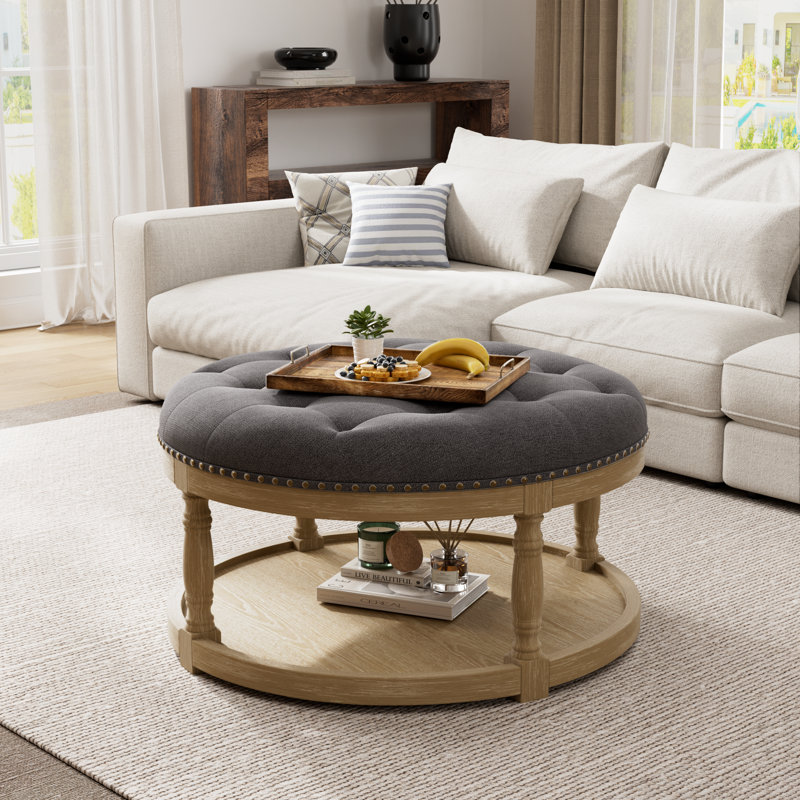 Cristan 33" W Upholstered Round Storage Ottoman, Dark Gray 