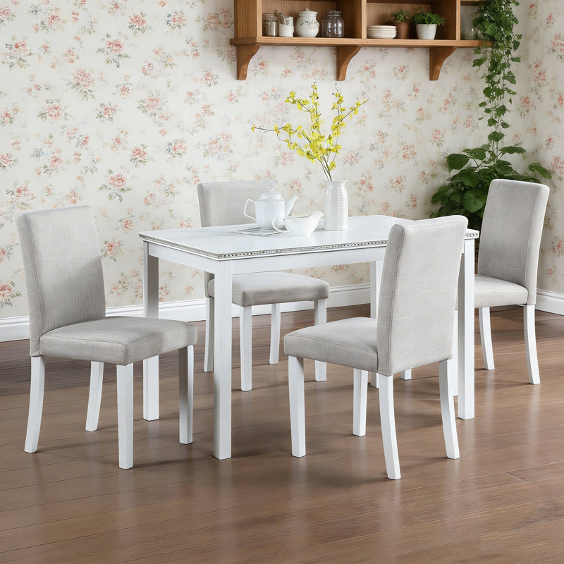5 pièces en bois Stolz avec une table rectangulaire et 4 chaises rembourrées