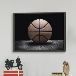 https://assets.wfcdn.com/im/31214685/resize-h310-w310%5Ecompr-r85/1208/120836985/vintage-basketball-on-black-framed-on-canvas-by-shawn-stpeter-print.jpg