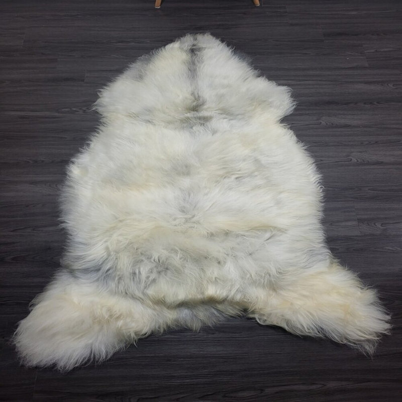 Tapis en peau de mouton Novelty Adebola