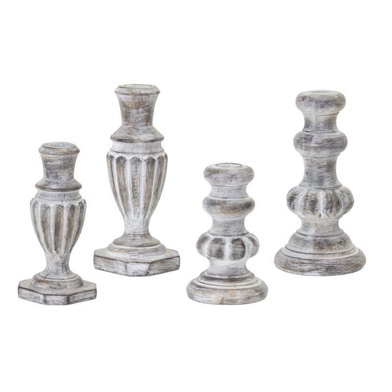 Ensemble de quatre chandelles de table en résine blanchie