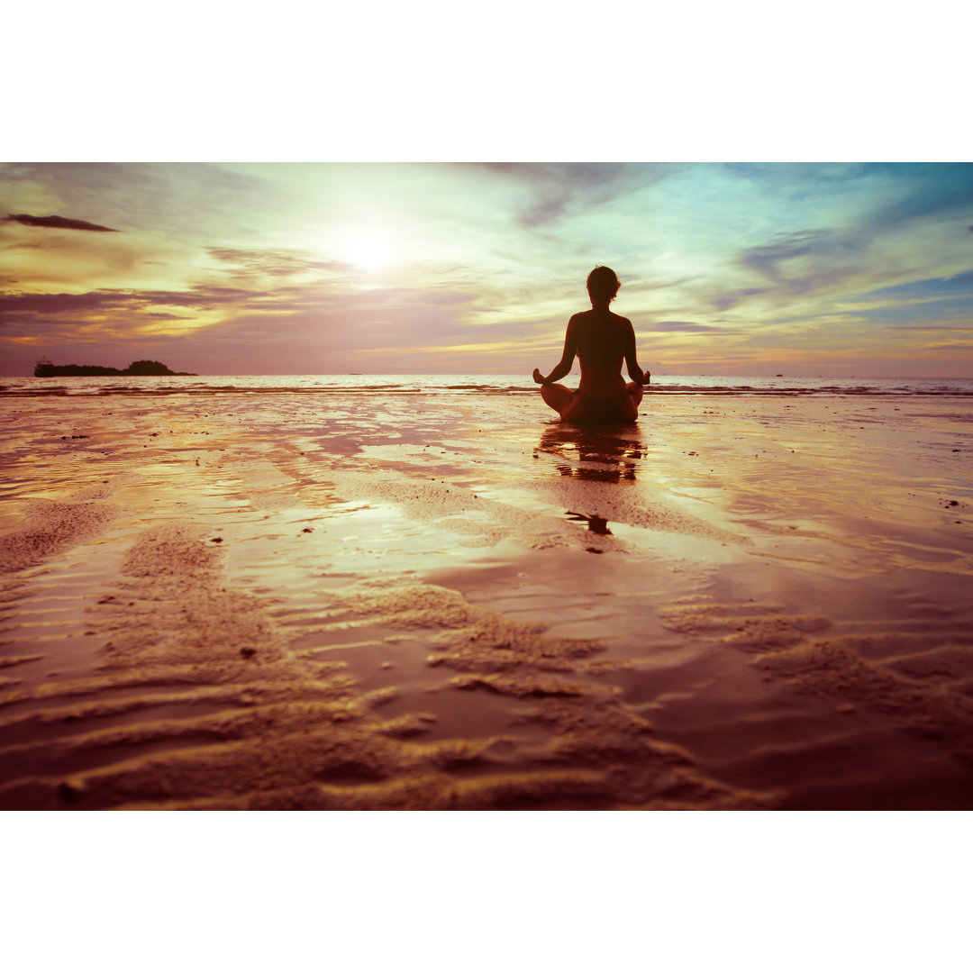 Leinwandbild Meditation am Strand