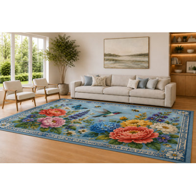 Grand tapis décoratif bleu pâle et multicolore 6 pi 7 po x 9 pi 10 po Bloom