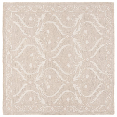 Antoiniece Tufted Wool/Cotton Damask Rug in Beige/Ivory