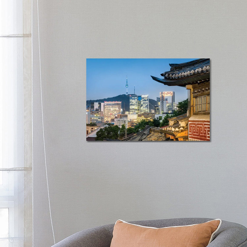 Historic Bukchon Hanok Village In Seoul With View Of The N Seoul Tower And Namsan Mountain by Jan Becke - Wrapped Canvas Print