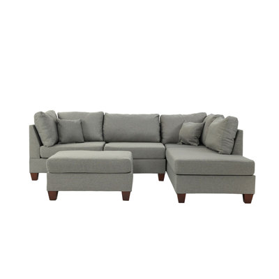 Reversible Polyfiber Sectional Sofa with Ottoman, Grey, Perfect for Versatile and Comfortable Seating in Any Living Room.