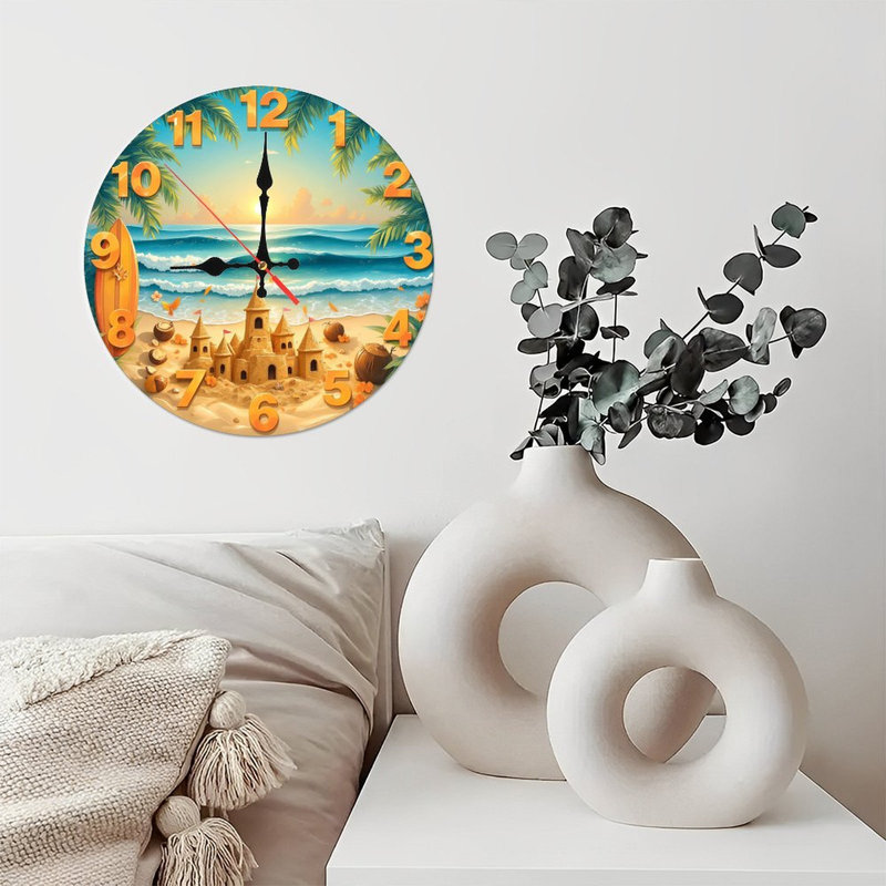 Horloge murale plage avec coucher de soleil et château de sable