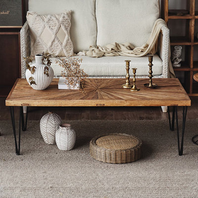 Table basse brune et noire en bois massif et fer