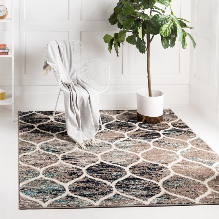 Llanet Geometric Area Rug
