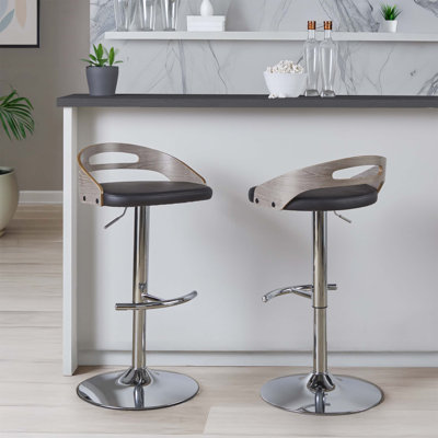 Tabouret de bar pivotant réglable avec repose-pieds rond en T, siège à hauteur variable pour un comptoir et un bar, design d'intérieur durable.
