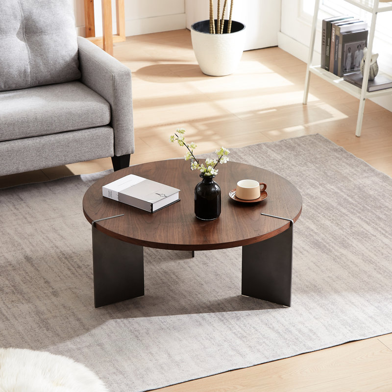 Table basse brun foncé avec forme ronde - surface en bois de noyer et structure en métal noir pour un style de vie moderne, plateau lisse en stratifié facile à nettoyer