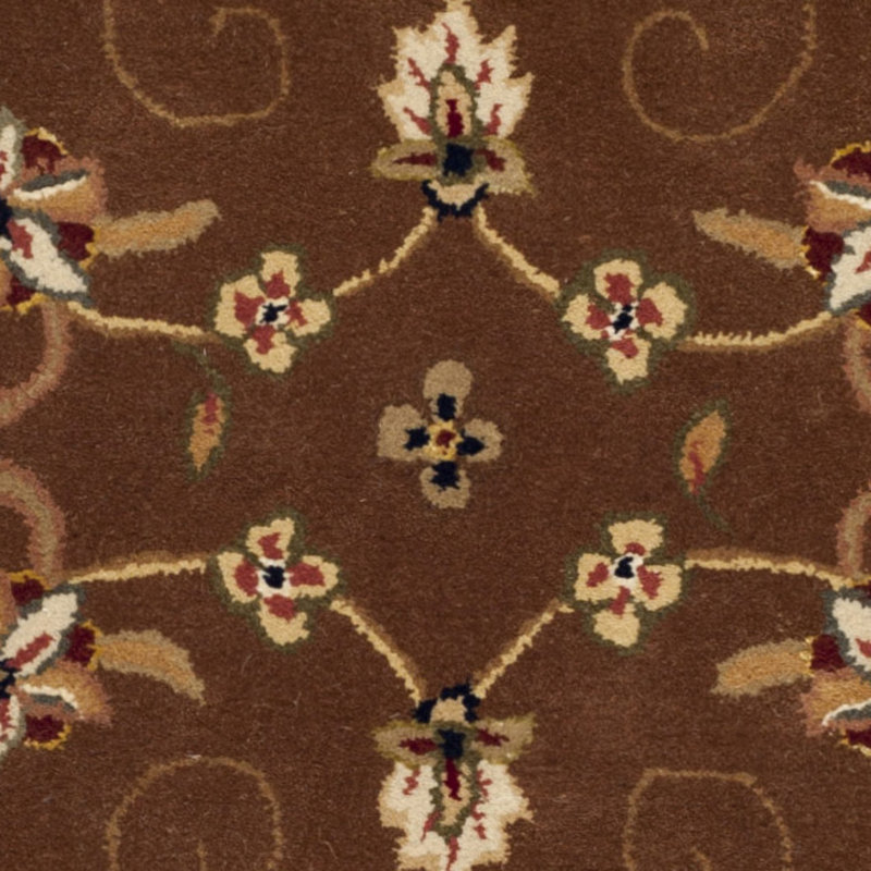 Handmade Tan and Ivory Tufted Wool Round Rug