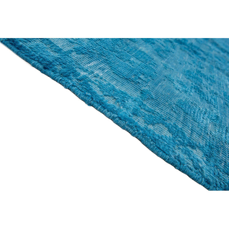 Tapis bleu Kalmanovitz
