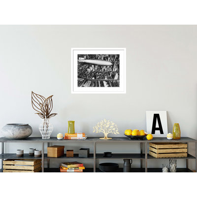 The German airship the Hindenburg above Manhattan New York in 1936 on its way to its berth at Lakehurst  New Jersey the same place where it inexplicably burst into flames the next year. by Unknown -Framed Giclee Print