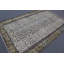Tapis turc fait à la main avec des tons de terre et des motifs floraux pour une décoration intérieure élégante