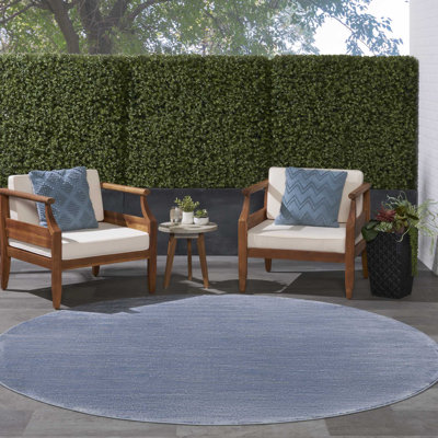 Mulican Solid Color Machine Made Power Loom Polypropylene Indoor / Outdoor Area Rug in Blue