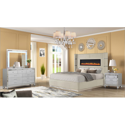 Ensemble de chambre avec très grand lit tapissier en bois avec éclairage ambiant