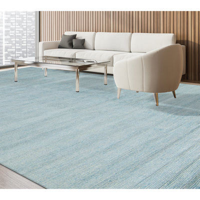 Tapis bleu clair noué à la main de haute qualité
