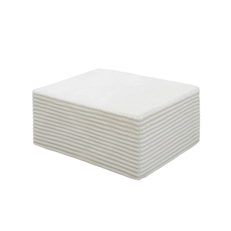 Luxueux repose-pieds en velours côtelé moelleux avec une conception modulaire, parfait pour le confort et l'efficacité de l'espace dans les maisons modernes.
