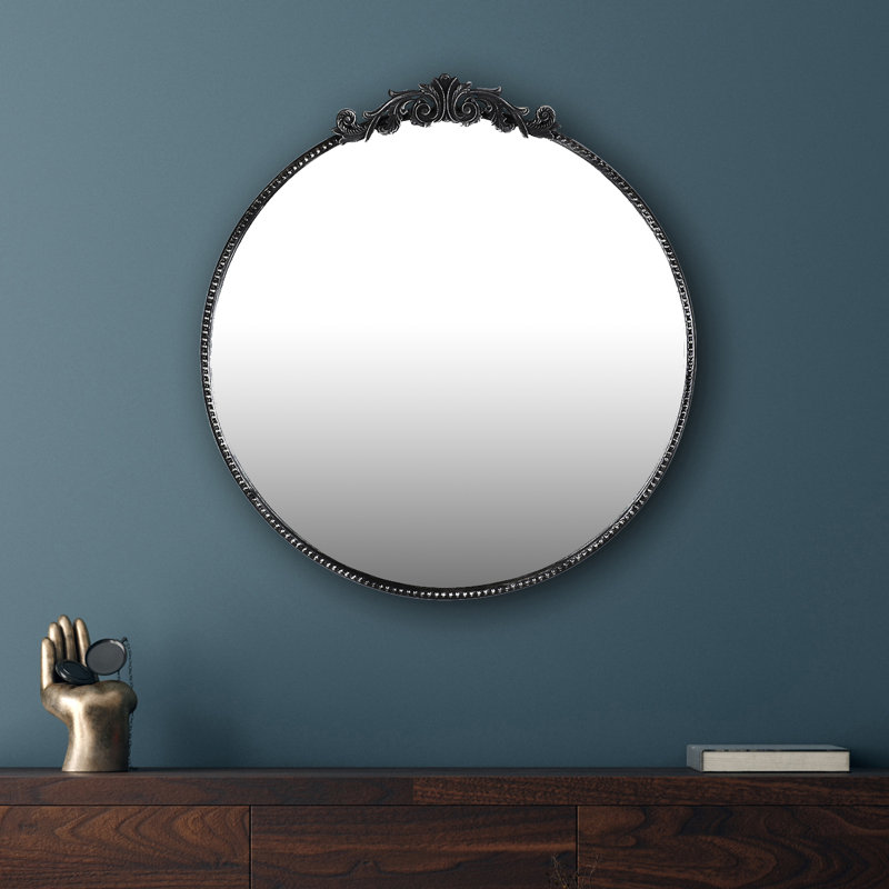 Miroir mural rond orné d'inspiration baroque, Noir