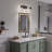 3-Light Matte Black Vanity Light with Clear Ribbed Glass Shades