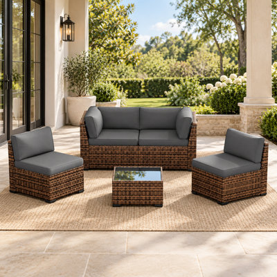 4-Person Wicker Patio Conversation Set with Cushions and Coffee Table