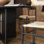 Table ronde simple en bois de frêne noir texturé-114982180