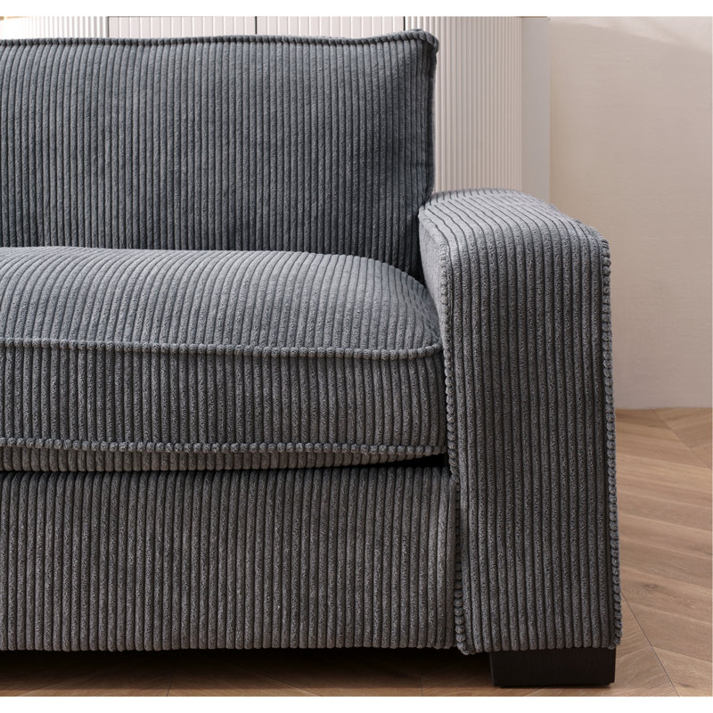 Canapé luxueux en velours côtelé de luxe avec un design élégant, spacieux et confortable pour un salon moderne, idéal pour le divertissement et les moments de détente, grand, gris