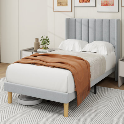 Sutter Upholstered Wingback Bed