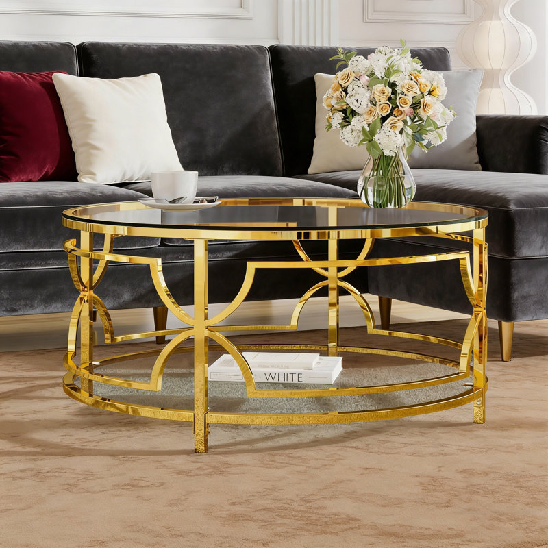 Table basse ronde avec plateau en verre trempé, structure en métal géométrique et tablette inférieure, Transparent