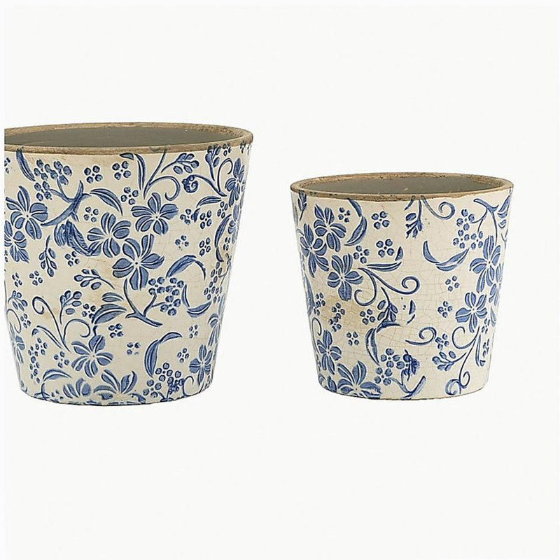 S / 2 jardinières en céramique bleue et blanche à motif floral