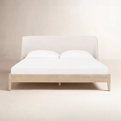 Cloey Upholstered Wingback Bed