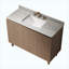 Meuble-lavabo autoportant Heidelberg 48 po à motif bois avec lavabo, comptoir en granit naturel, lavabo en céramique et 3 trous pour robinetterie (robinet et bonde non inclus).