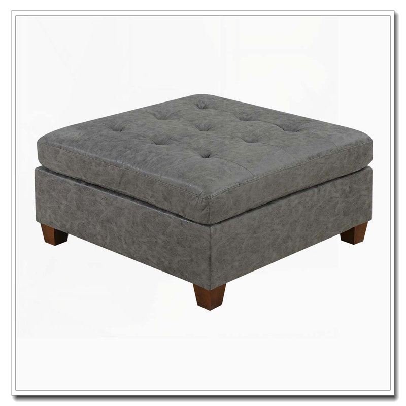 Repose-pieds capitonné en similicuir gris antique
