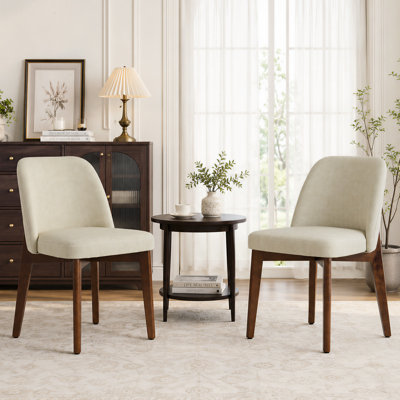 Ensemble de 2 chaises de salle à manger modernes en similicuir de 51,6 cm de large, avec pieds en bois massif, faciles à nettoyer, idéales pour la salle à manger, le salon, la cuisine ou un appartement.