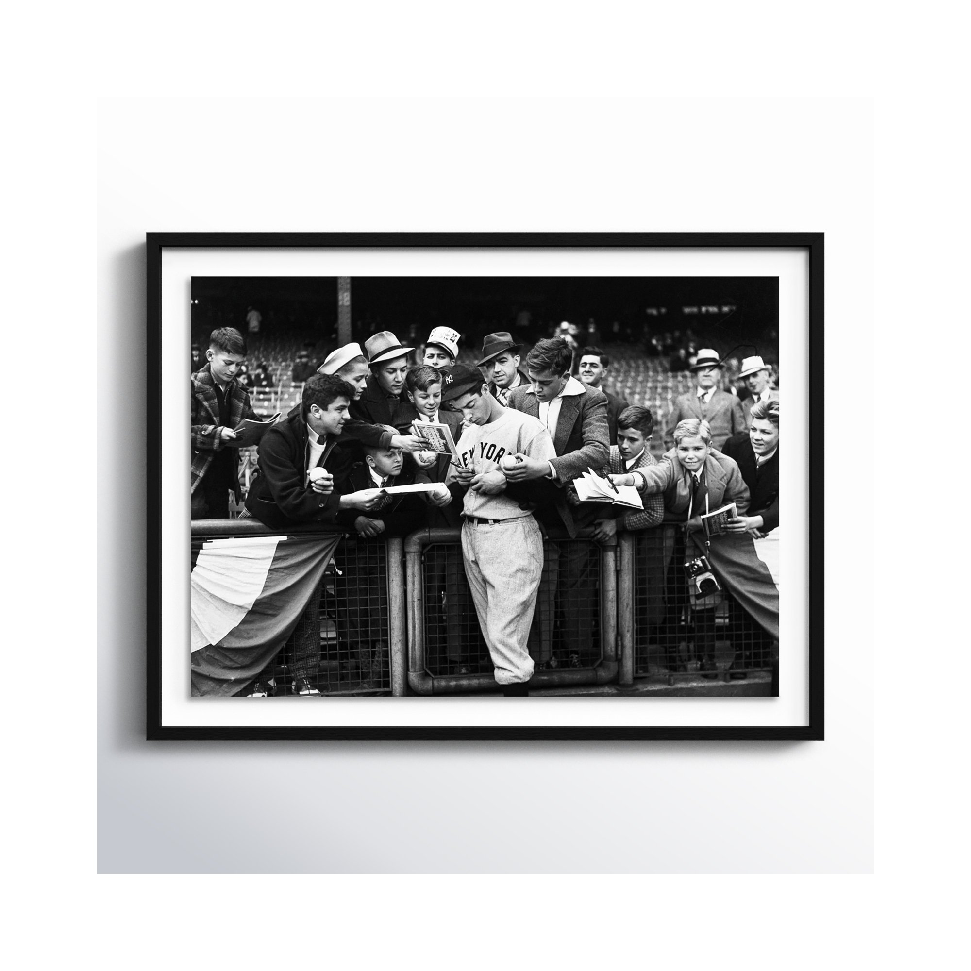 Joe DiMaggio Signing Autotgraphs For Fans by Getty Images, Black Maple Framed, 18" H x 24" W