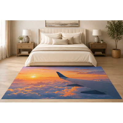 Tapis « ultra-fin » 152 x 213 cm (5 pi x 7 pi) à motif d'avion au-dessus des nuages ​​au coucher du soleil, idéal pour la chambre, le salon et le bureau à domicile. Moquette douce à poils courts avec envers antidérapant en silicone.