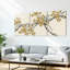 Ensemble de 3 tableaux muraux sur toile de style oriental représentant des branches de cerisier en fleurs dorées.-121570391
