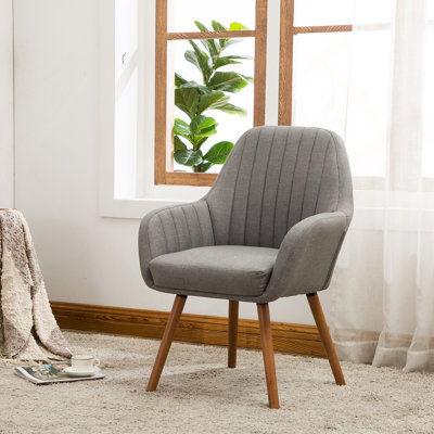 Fauteuil d'appoint contemporain en tissu alliant confort, style et durabilité pour une expérience confortable et invitante