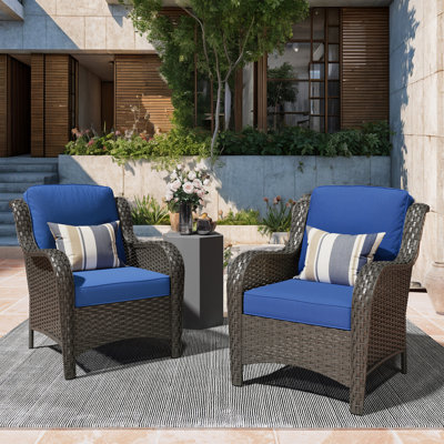 Chaise de patio en rotin avec coussins Guillen