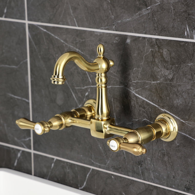 Kingston Brass Heirloom Double-Handle 2-Hole Wall-Mount Bridge Kitchen Faucet, Brushed Brass