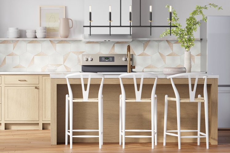 light-wood kitchen with white counter-height stools