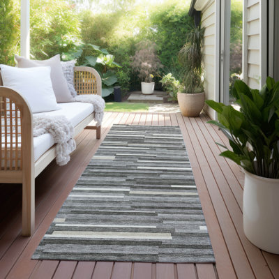 Malek Indoor/Outdoor Area Rug with Non-Slip Backing