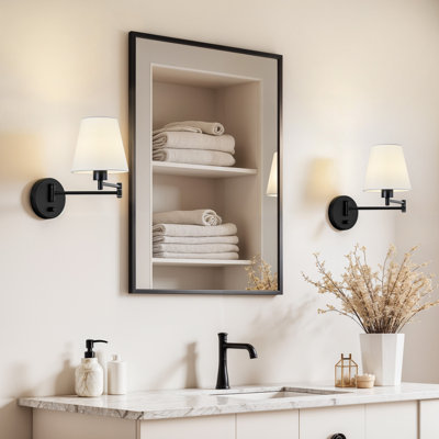 Applique à bras pivotant